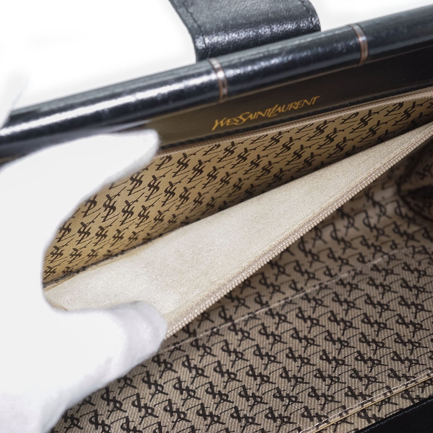 YSL Quilted Embossed Leather Clutch