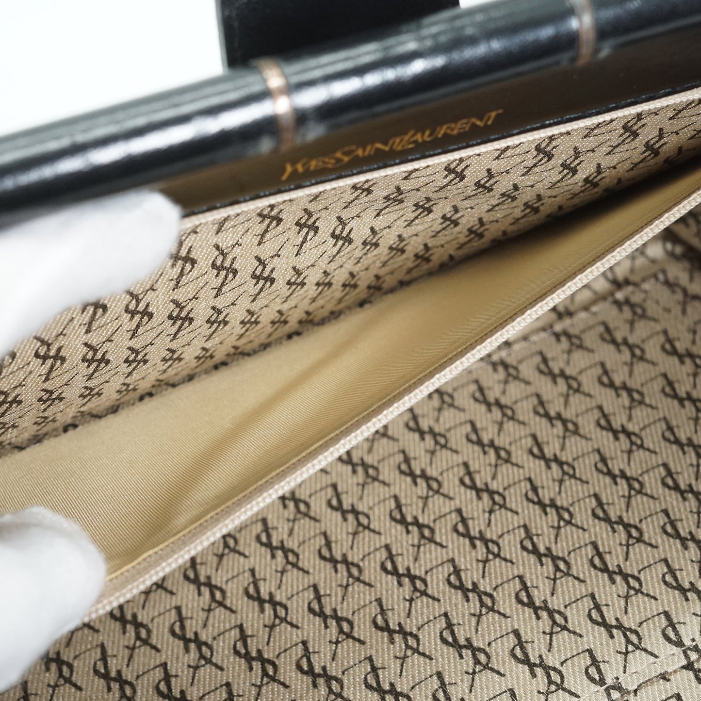 YSL Quilted Embossed Leather Clutch