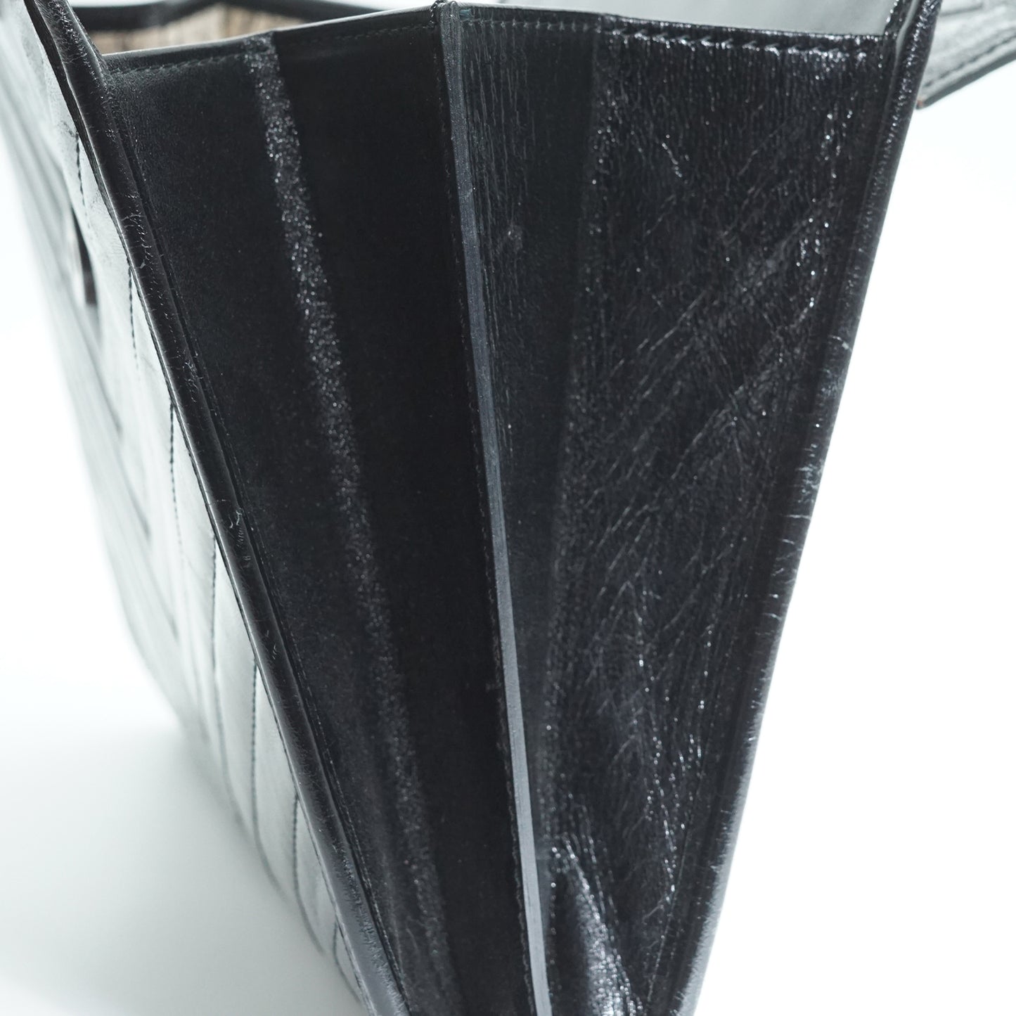 YSL Quilted Embossed Leather Clutch