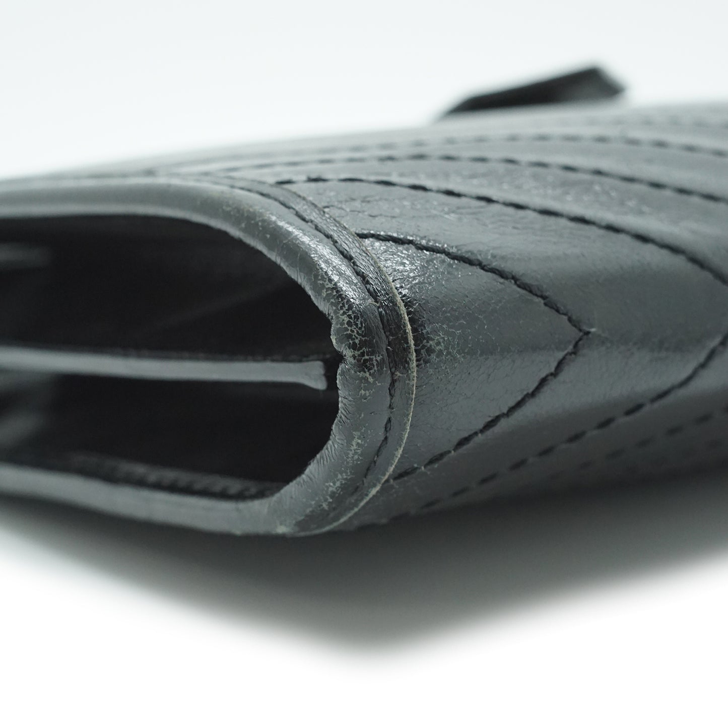 YSL Quilted Embossed Leather Clutch