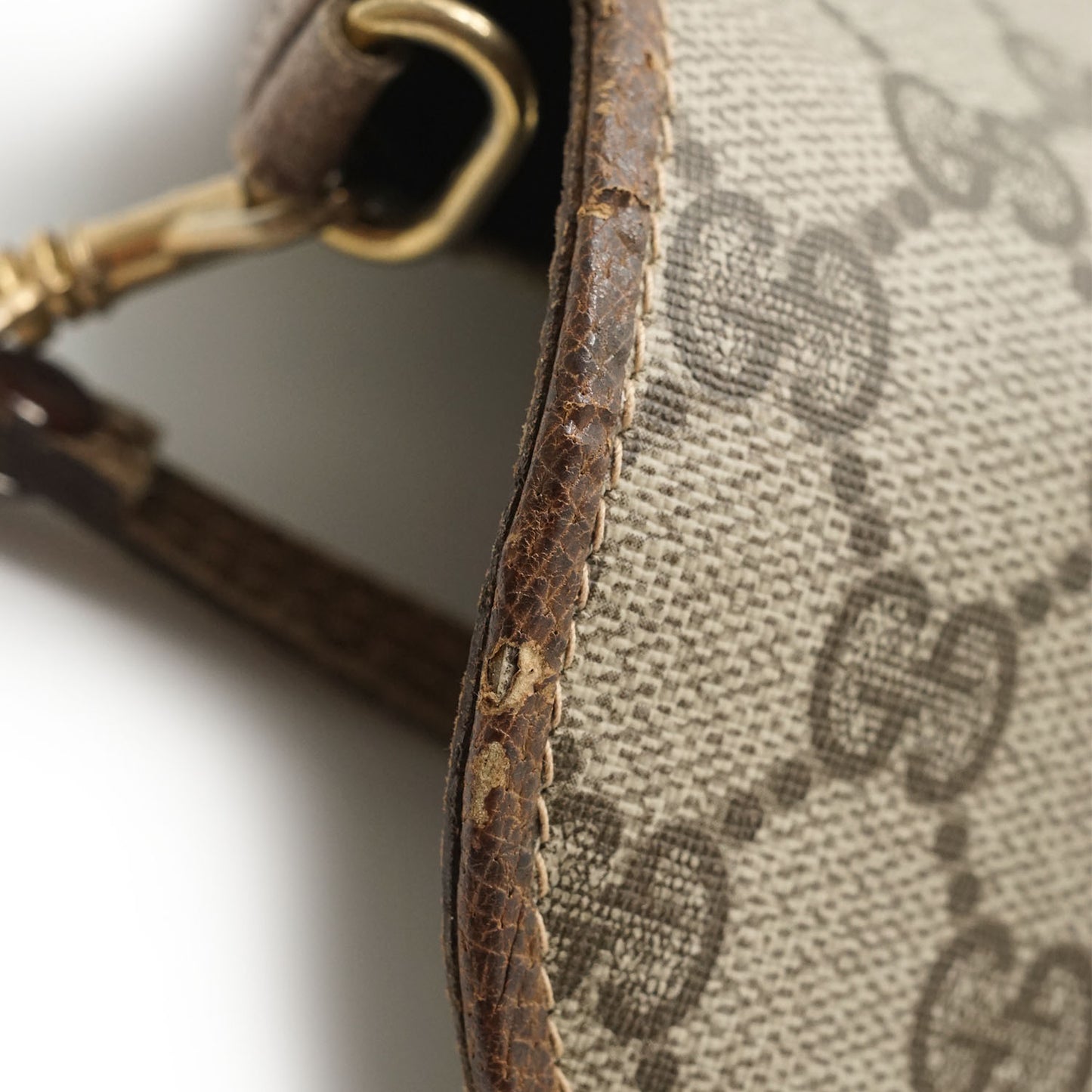 GG Supreme Coated Canvas Mini Rounded Crossbody Bag
