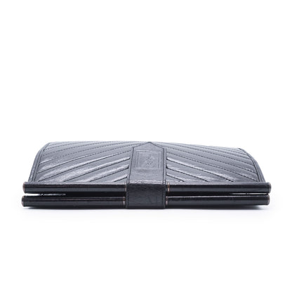 YSL Quilted Embossed Leather Clutch