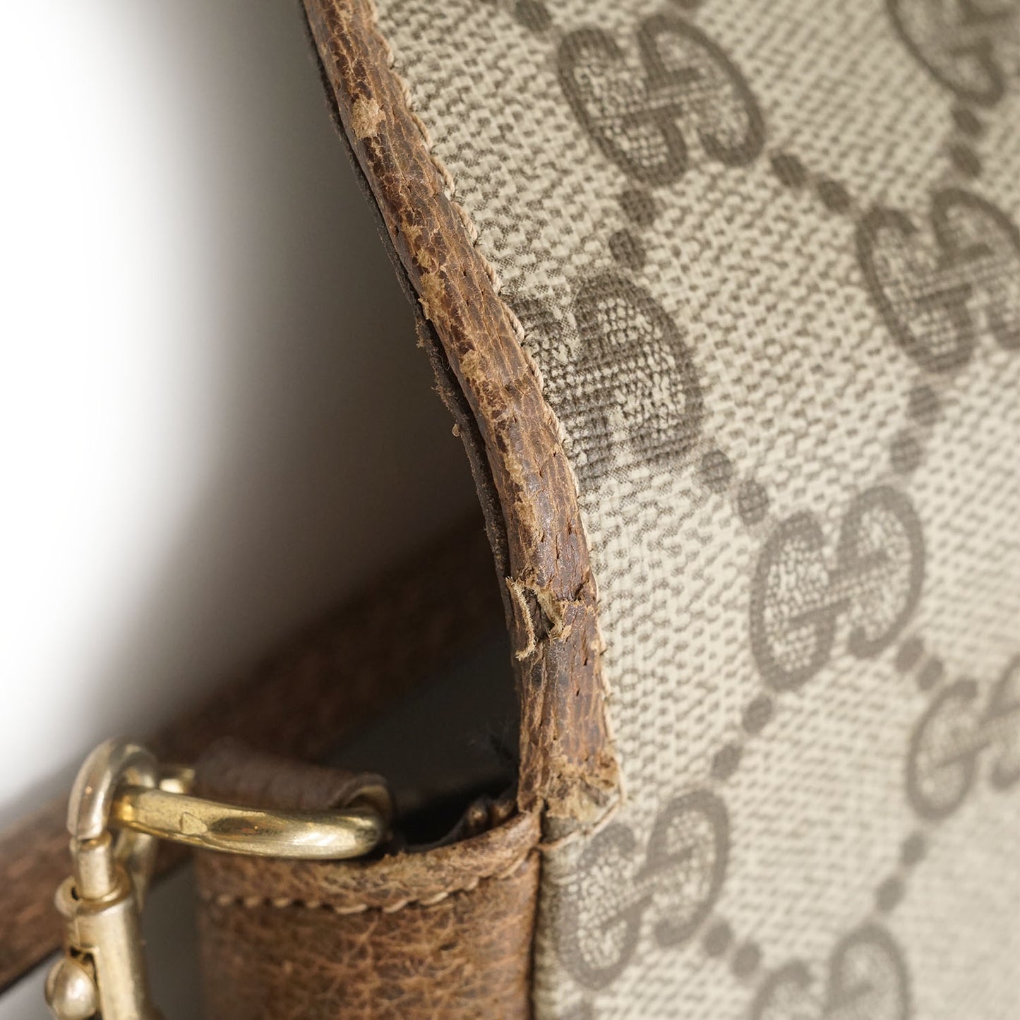 GG Supreme Coated Canvas Mini Rounded Crossbody Bag