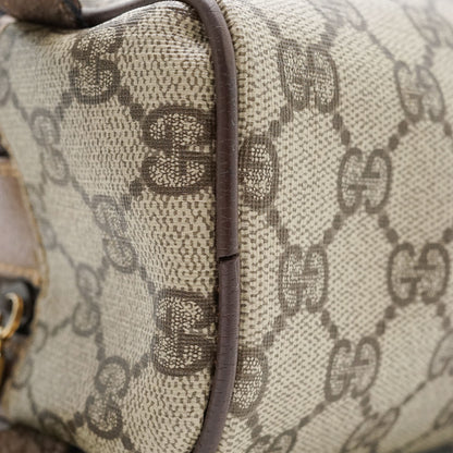 GG Supreme Coated Canvas Clutch