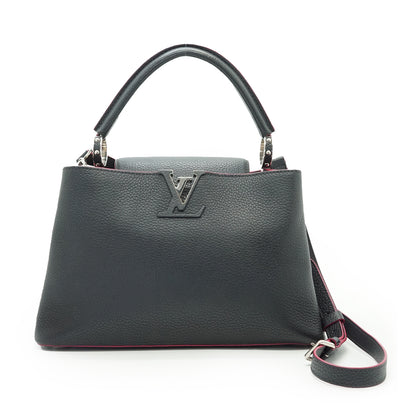 Capucines MM Taurillon Leather Noir Flamingo Limited Edition