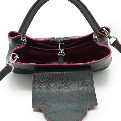 Capucines MM Taurillon Leather Noir Flamingo Limited Edition