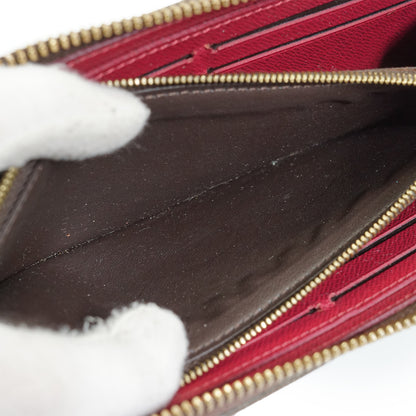 Monogram Portefeuille Clemence Fuchsia Long Wallet