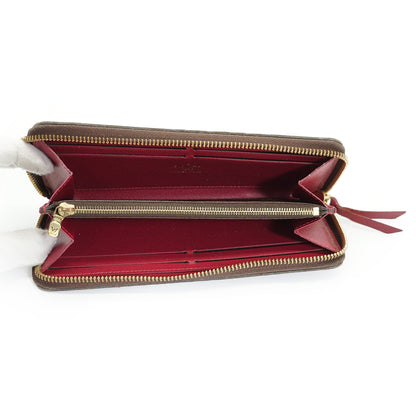 Monogram Portefeuille Clemence Fuchsia Long Wallet