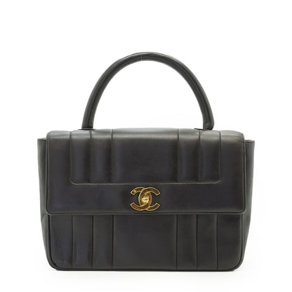 Vertical Quilted Lambskin Mademoiselle Top Handle Bag