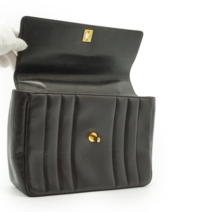 Vertical Quilted Lambskin Mademoiselle Top Handle Bag