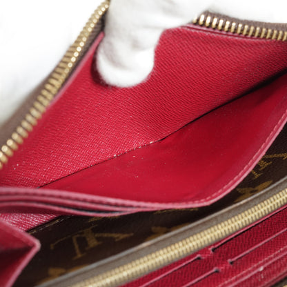 Monogram Portefeuille Clemence Fuchsia Long Wallet
