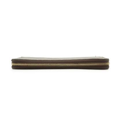 Monogram Portefeuille Clemence Fuchsia Long Wallet