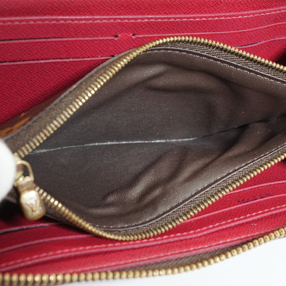 Monogram Portefeuille Clemence Fuchsia Long Wallet