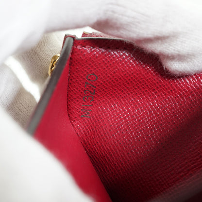 Monogram Portefeuille Zoe Fuchsia Compact Wallet