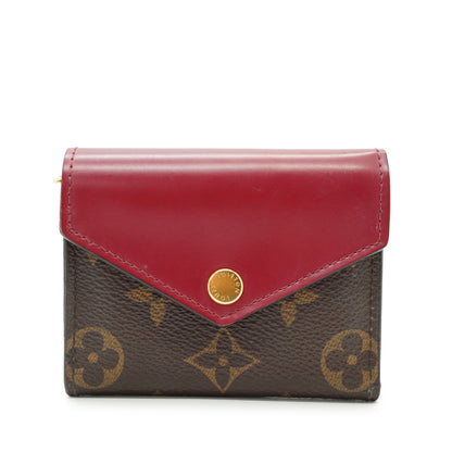 Monogram Portefeuille Zoe Fuchsia Compact Wallet