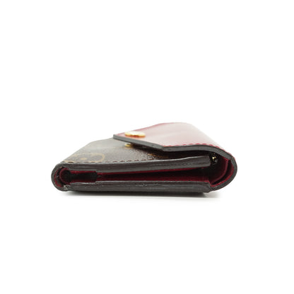 Monogram Portefeuille Zoe Fuchsia Compact Wallet