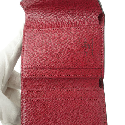 Monogram Portefeuille Zoe Fuchsia Compact Wallet