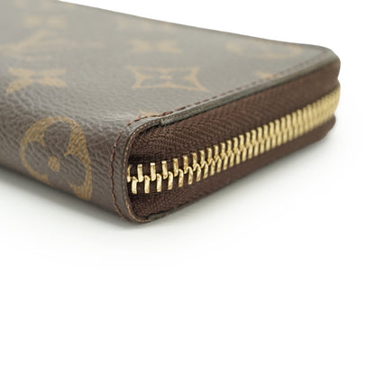 Monogram Portefeuille Clemence Fuchsia Long Wallet