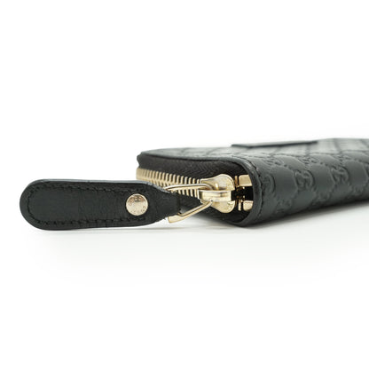 GG Microguccissima Round Zip Compact Wallet