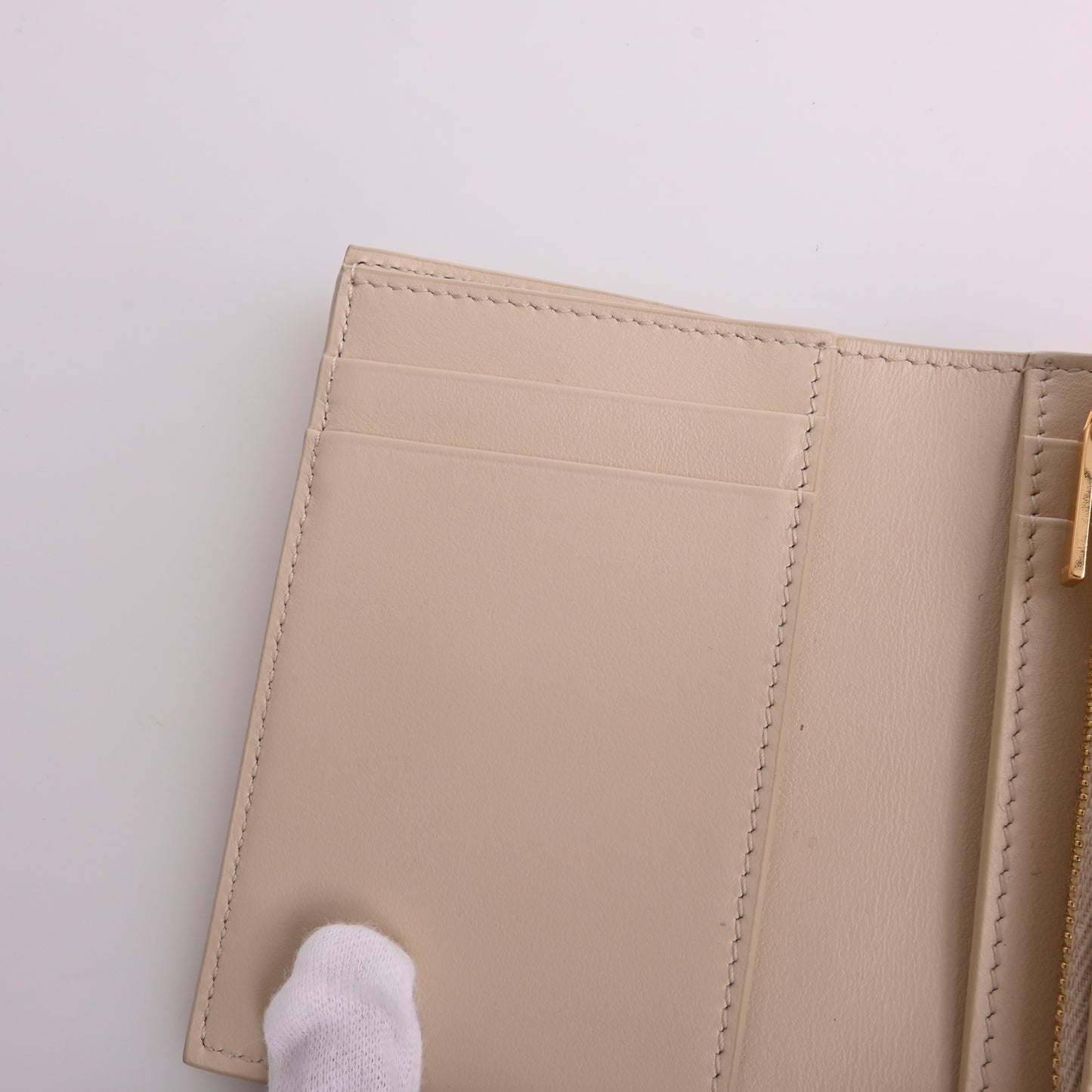 White leather tri-fold wallet