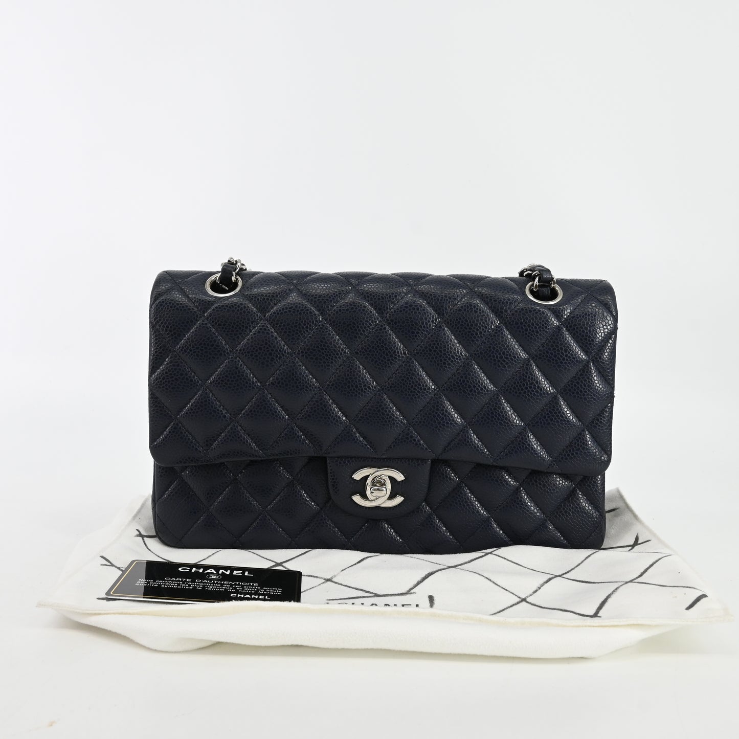 Caviar skin matelassé double flap double chain shoulder bag navy silver hardware 19 series